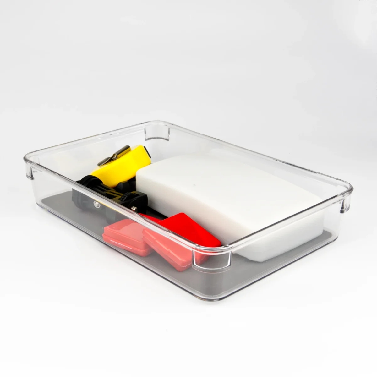 Atvilktnes organizators ar pelēku pamatni un kancelejas piederumiem, 24×16×4.5 cm